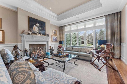 1020 Bel-Aire Drive, Calgary, AB - Indoor Photo Showing Living Room With Fireplace