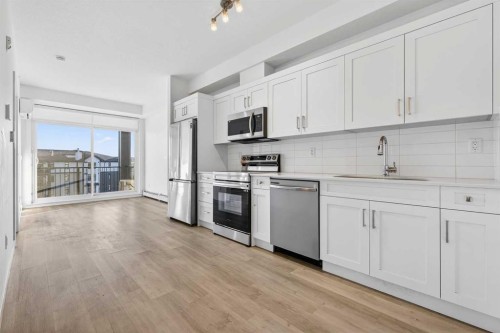 411-40 Sage Hill Walk Nw, Calgary, AB - Indoor Photo Showing Kitchen With Stainless Steel Kitchen