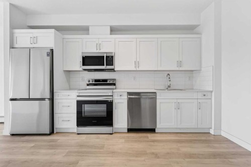 411-40 Sage Hill Walk Nw, Calgary, AB - Indoor Photo Showing Kitchen With Stainless Steel Kitchen