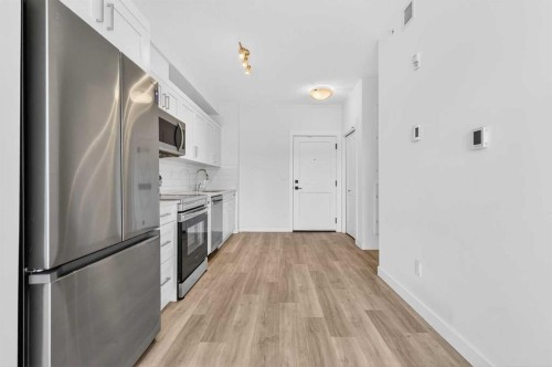 411-40 Sage Hill Walk Nw, Calgary, AB - Indoor Photo Showing Kitchen With Stainless Steel Kitchen