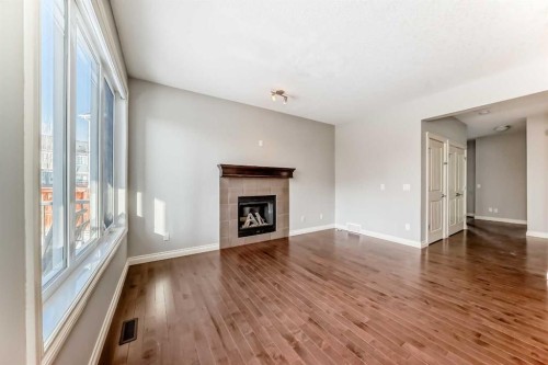 58 Sherwood Street Nw, Calgary, AB - Indoor Photo Showing Living Room With Fireplace