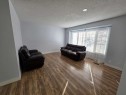 192 Templevale Road Ne, Calgary, AB  - Indoor Photo Showing Living Room 
