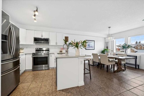 3 Tucker Circle, Okotoks, AB - Indoor Photo Showing Kitchen With Stainless Steel Kitchen With Upgraded Kitchen