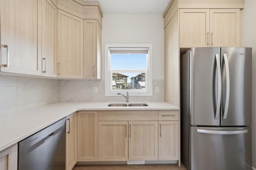 292 Cornerbrook Drive Ne, Calgary, AB - Indoor Photo Showing Kitchen With Double Sink