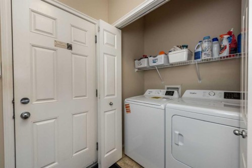 212 Silverado Range Heights Sw, Calgary, AB - Indoor Photo Showing Laundry Room