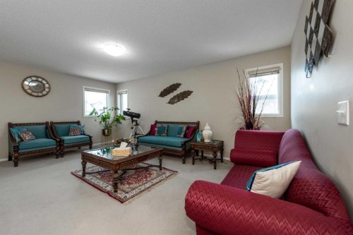 212 Silverado Range Heights Sw, Calgary, AB - Indoor Photo Showing Living Room