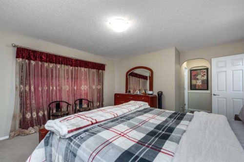 212 Silverado Range Heights Sw, Calgary, AB - Indoor Photo Showing Bedroom