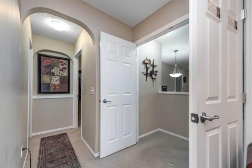 212 Silverado Range Heights Sw, Calgary, AB - Indoor Photo Showing Other Room