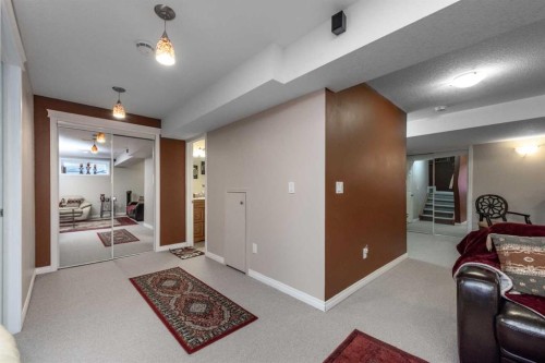 212 Silverado Range Heights Sw, Calgary, AB - Indoor Photo Showing Other Room