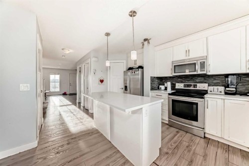 366 Auburn Bay Avenue Se, Calgary, AB - Indoor Photo Showing Kitchen With Upgraded Kitchen