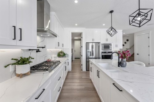 27 Bridges Drive, Langdon, AB - Indoor Photo Showing Kitchen With Upgraded Kitchen