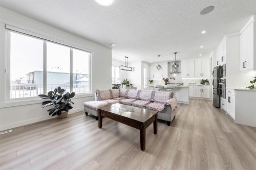 27 Bridges Drive, Langdon, AB - Indoor Photo Showing Living Room