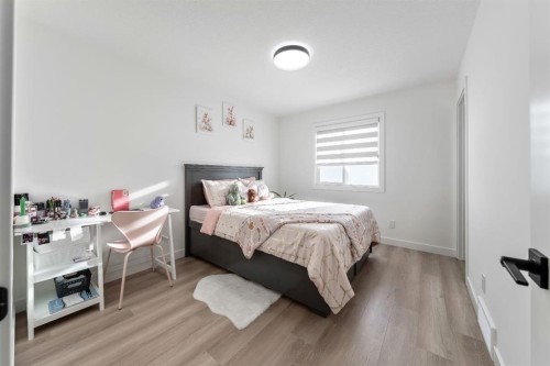 27 Bridges Drive, Langdon, AB - Indoor Photo Showing Bedroom