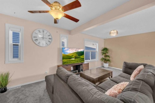 131 Coral Springs Circle Ne, Calgary, AB - Indoor Photo Showing Living Room
