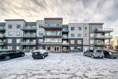316-200 Shawnee Square Sw, Calgary, AB - Outdoor With Balcony With Facade