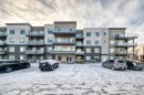 316-200 Shawnee Square Sw, Calgary, AB  - Outdoor With Balcony With Facade 