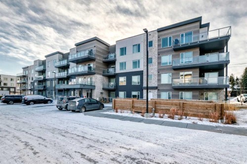 316-200 Shawnee Square Sw, Calgary, AB - Outdoor With Balcony With Facade