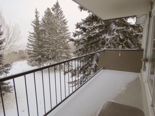 204-328 Cedar Crescent Sw, Calgary, AB - Outdoor With Balcony With Exterior