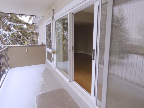 204-328 Cedar Crescent Sw, Calgary, AB - Outdoor With Balcony With Exterior