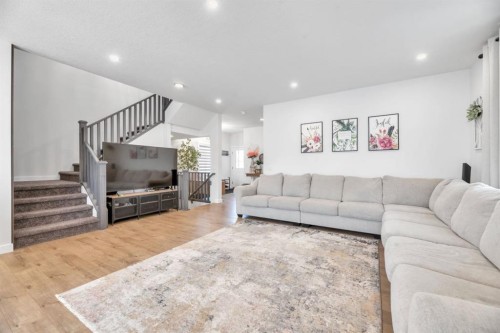 240 Creekstone Path Sw, Calgary, AB - Indoor Photo Showing Living Room