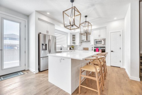 240 Creekstone Path Sw, Calgary, AB - Indoor Photo Showing Kitchen With Upgraded Kitchen