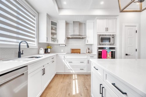 240 Creekstone Path Sw, Calgary, AB - Indoor Photo Showing Kitchen With Upgraded Kitchen