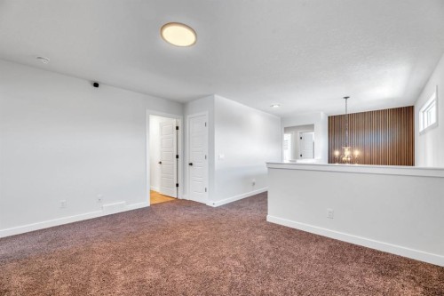 240 Creekstone Path Sw, Calgary, AB - Indoor Photo Showing Other Room