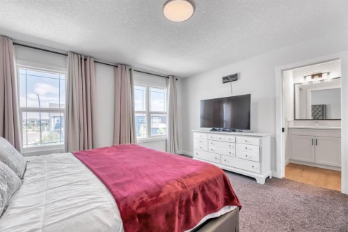 240 Creekstone Path Sw, Calgary, AB - Indoor Photo Showing Bedroom