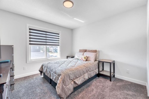240 Creekstone Path Sw, Calgary, AB - Indoor Photo Showing Bedroom