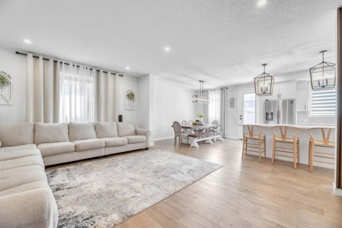 240 Creekstone Path Sw, Calgary, AB - Indoor Photo Showing Living Room