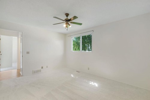 127 Falshire Way Ne, Calgary, AB - Indoor Photo Showing Other Room