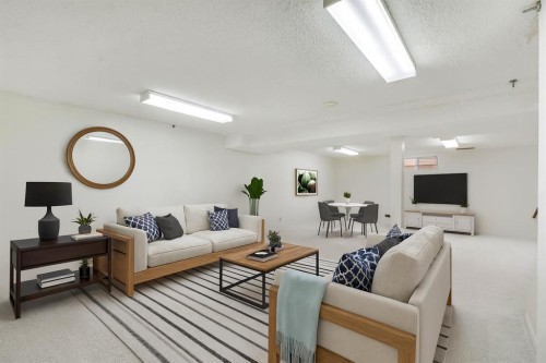 127 Falshire Way Ne, Calgary, AB - Indoor Photo Showing Living Room