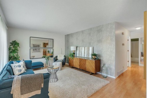127 Falshire Way Ne, Calgary, AB - Indoor Photo Showing Living Room