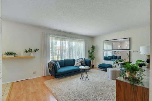 127 Falshire Way Ne, Calgary, AB - Indoor Photo Showing Living Room