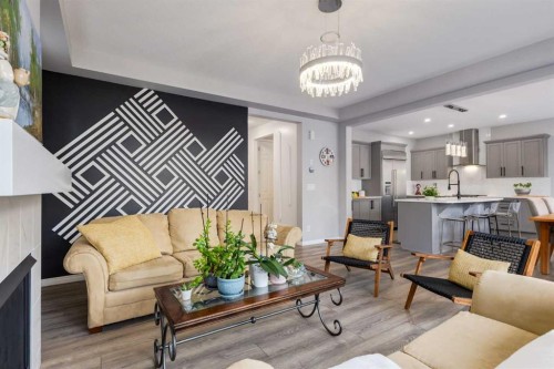 68 Yorkstone Grove Sw, Calgary, AB - Indoor Photo Showing Living Room