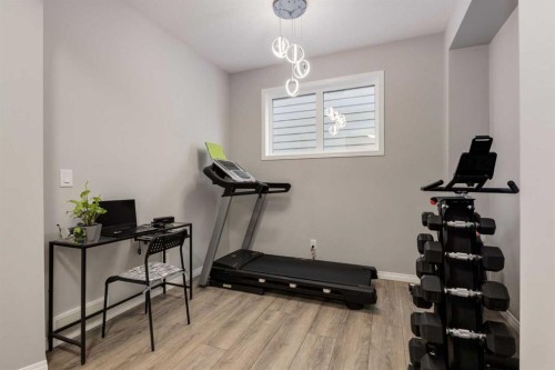 68 Yorkstone Grove Sw, Calgary, AB - Indoor Photo Showing Gym Room
