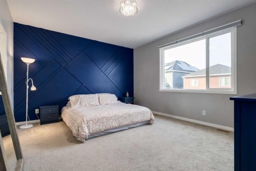 68 Yorkstone Grove Sw, Calgary, AB - Indoor Photo Showing Bedroom