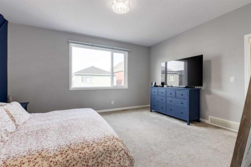 68 Yorkstone Grove Sw, Calgary, AB - Indoor Photo Showing Bedroom