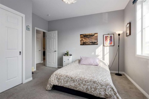 68 Yorkstone Grove Sw, Calgary, AB - Indoor Photo Showing Bedroom