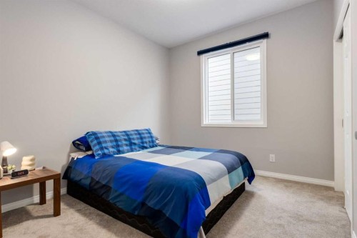 68 Yorkstone Grove Sw, Calgary, AB - Indoor Photo Showing Bedroom