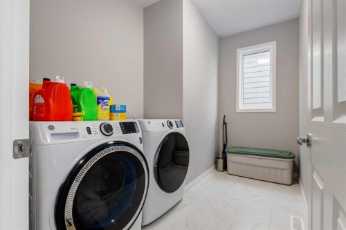 68 Yorkstone Grove Sw, Calgary, AB - Indoor Photo Showing Laundry Room