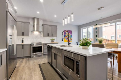 68 Yorkstone Grove Sw, Calgary, AB - Indoor Photo Showing Kitchen With Upgraded Kitchen