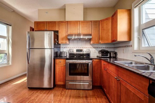 459-333 Riverfront Avenue Se, Calgary, AB - Indoor Photo Showing Kitchen With Double Sink