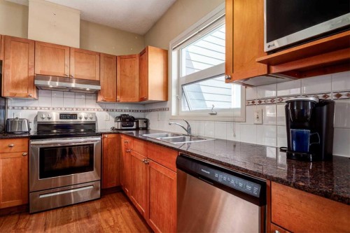 459-333 Riverfront Avenue Se, Calgary, AB - Indoor Photo Showing Kitchen With Double Sink