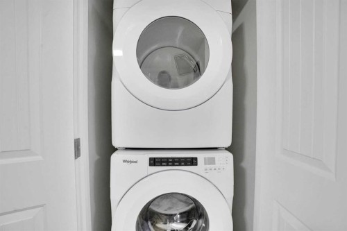 514 Wolf Willow Boulevard Se, Calgary, AB - Indoor Photo Showing Laundry Room