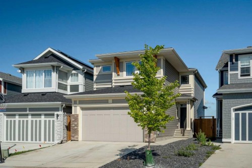 36 Magnolia Bay Se, Calgary, AB - Outdoor With Facade