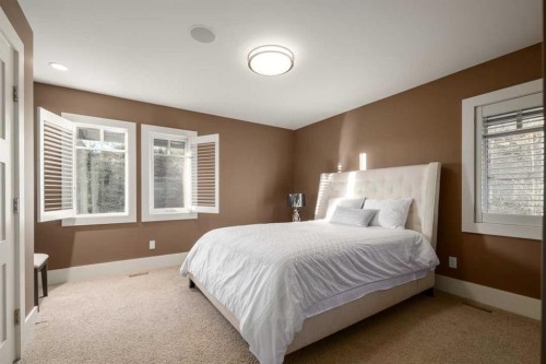 16 Spring Valley Way Sw, Calgary, AB - Indoor Photo Showing Bedroom