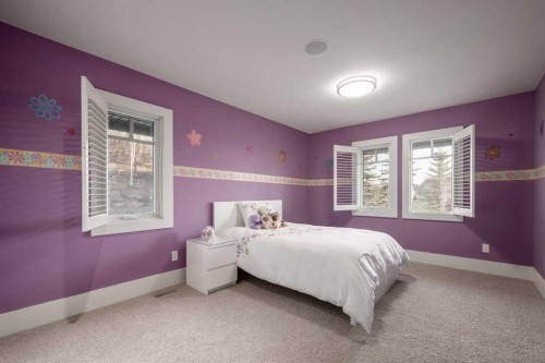 16 Spring Valley Way Sw, Calgary, AB - Indoor Photo Showing Bedroom