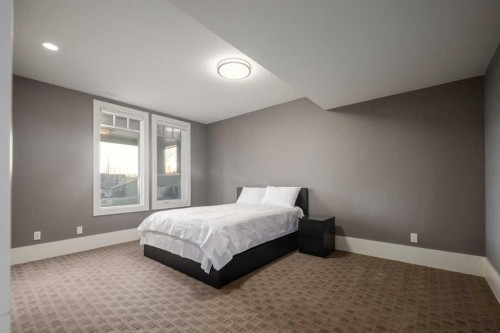 16 Spring Valley Way Sw, Calgary, AB - Indoor Photo Showing Bedroom