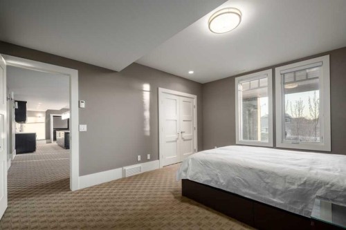 16 Spring Valley Way Sw, Calgary, AB - Indoor Photo Showing Bedroom